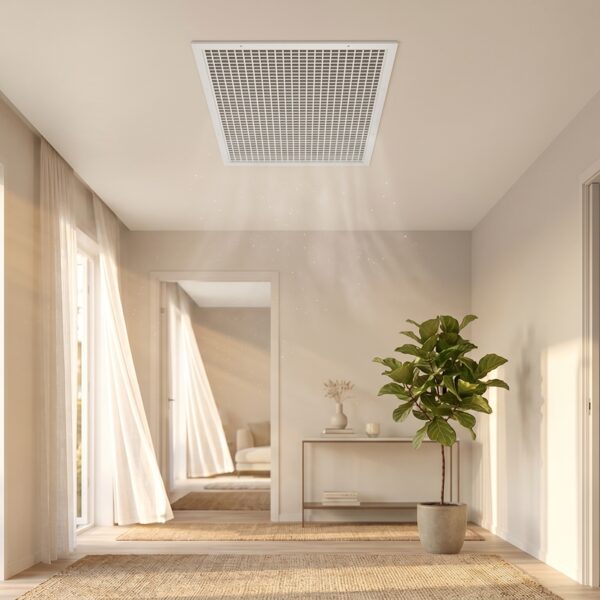 Whole house fan grille installed flush in a home ceiling — the finished look.